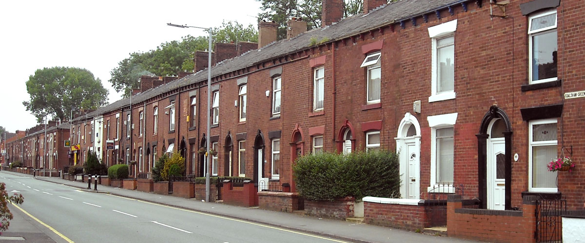 Unoccupied terrace property on busy residential street